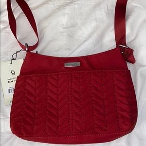 red cross bag from baggallini.